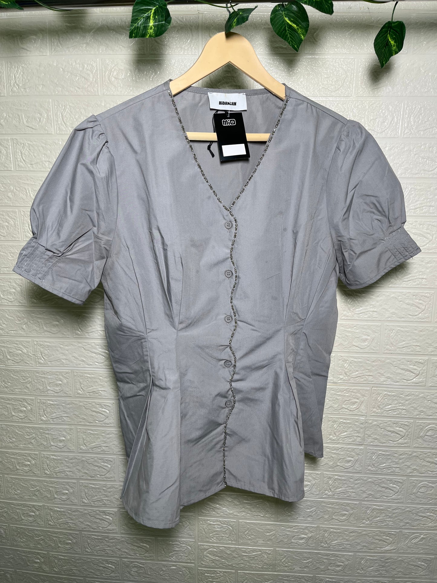Gleam in Grey Shirt