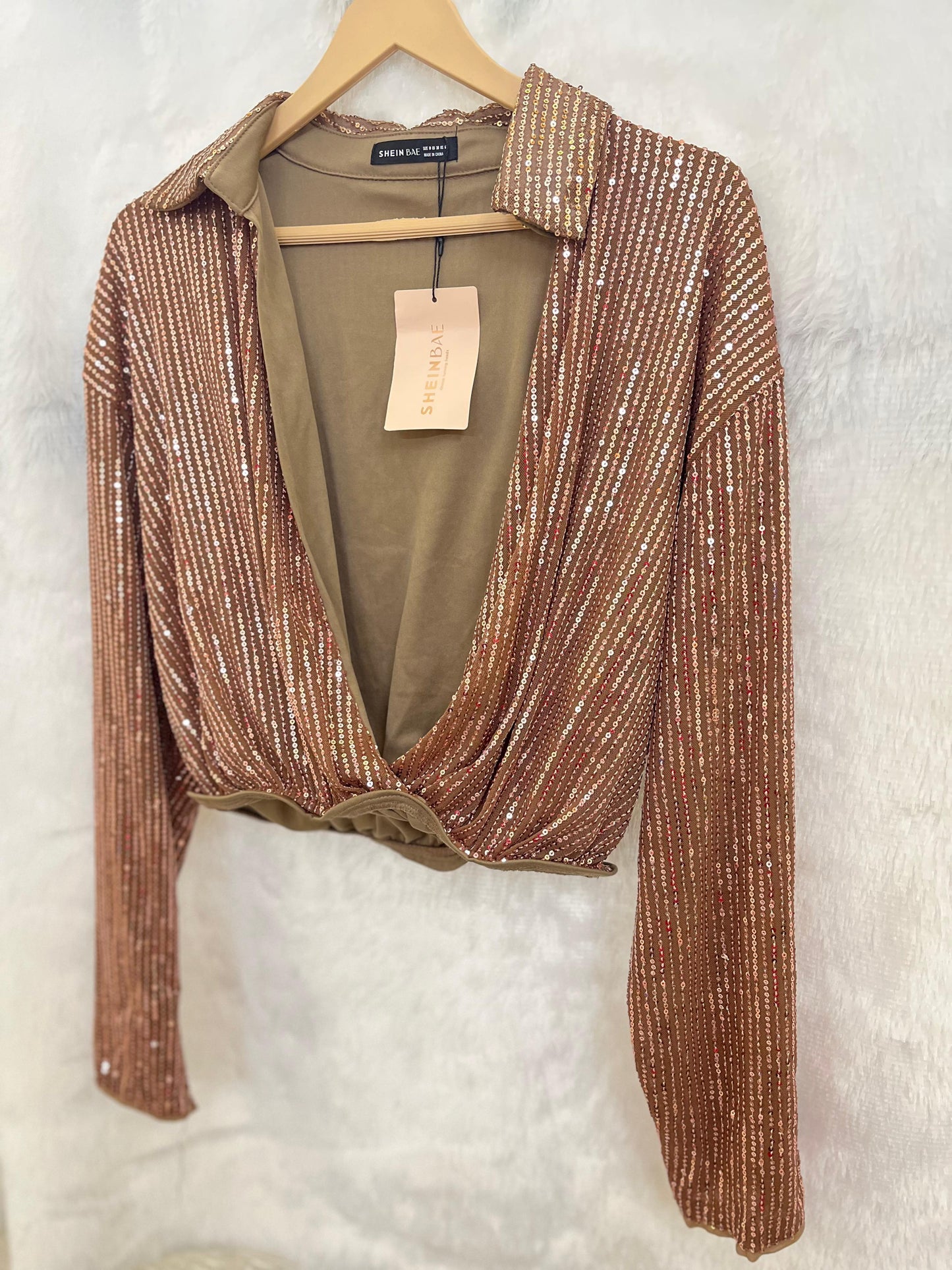 22. Open V-Neck Sequin Top